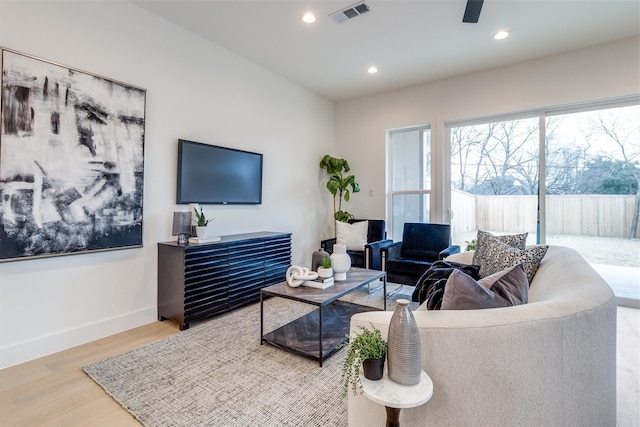 417 Wayne St, Dallas, TX 75223 - living room with visible vents, baseboards, recessed lighting, wood finished floors, and a ceiling fan