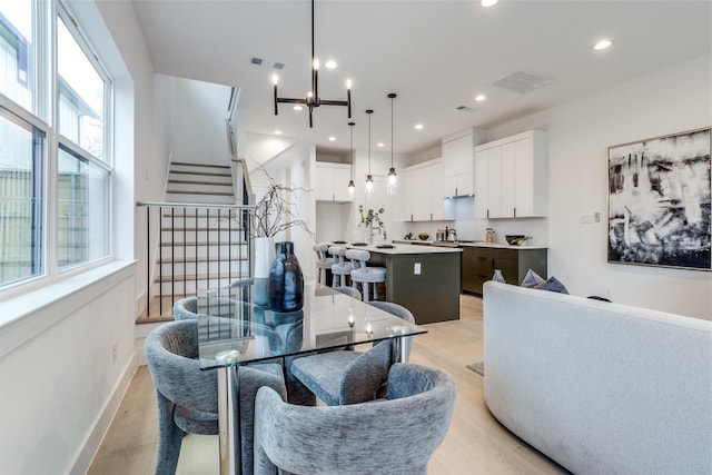 417 Wayne St, Dallas, TX 75223 - kitchen featuring modern cabinets, stainless steel appliances, and visible vents