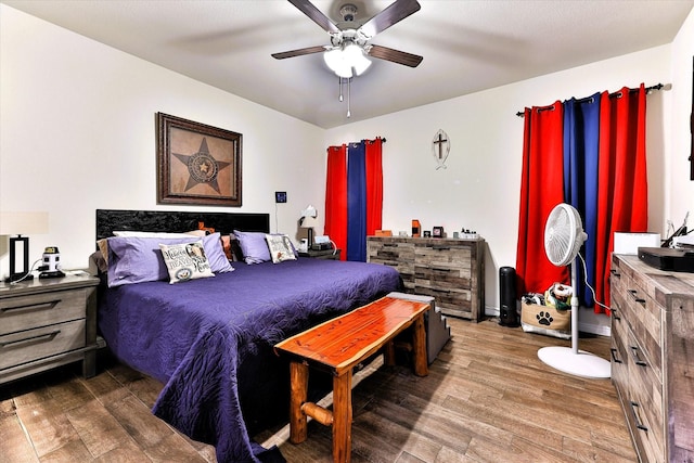 bedroom featuring hardwood / wood-style floors and ceiling fan