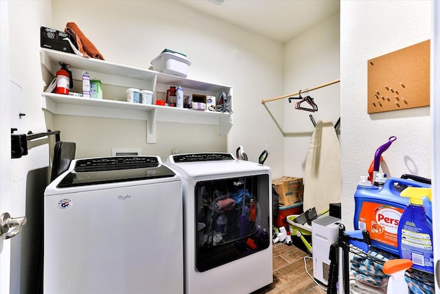 laundry room featuring washing machine and clothes dryer