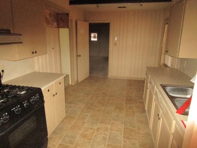 3359 Green Terrace Rd, Shreveport, LA 71118 - kitchen featuring black stove, sink, exhaust hood, and white cabinets