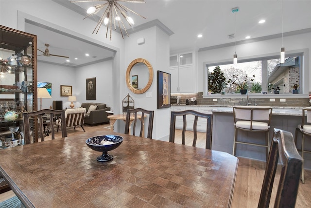 477 Lakepoint Loop, Pottsboro, TX 75076 - dining area featuring recessed lighting, visible vents, ornamental molding, and ceiling fan with notable chandelier