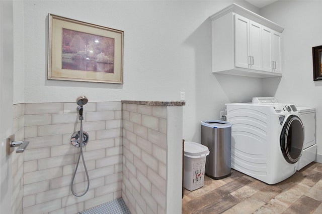 477 Lakepoint Loop, Pottsboro, TX 75076 - laundry room featuring cabinet space and washer and clothes dryer