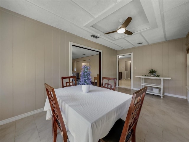 dining space with light tile patterned flooring and ceiling fan