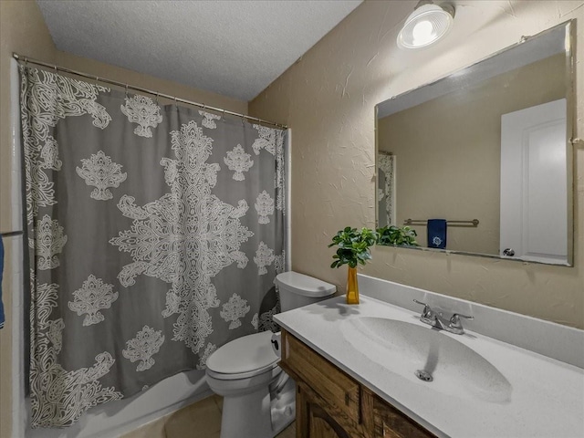 bathroom featuring a shower with curtain, vanity, a textured ceiling, and toilet