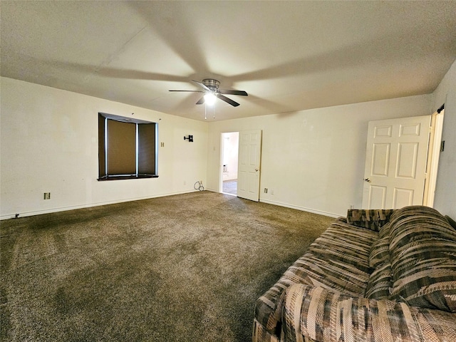 unfurnished living room featuring ceiling fan and dark carpet