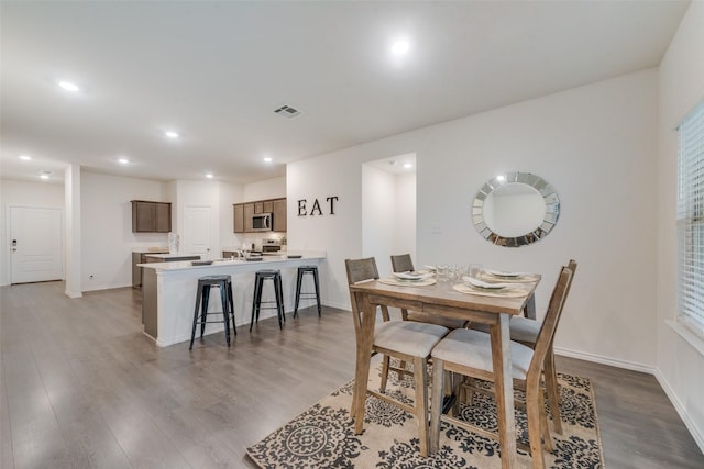 dining room featuring light hardwood / wood-style flooring