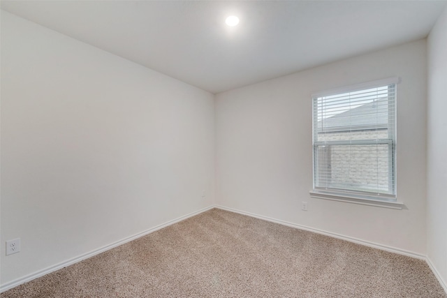 empty room featuring carpet floors