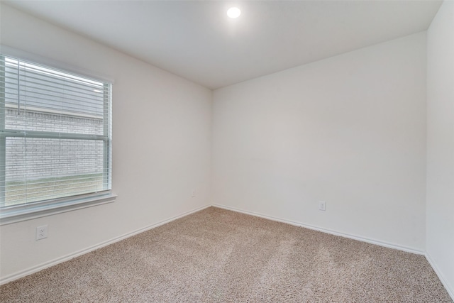 view of carpeted spare room