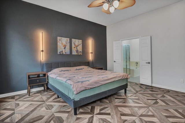 bedroom with ensuite bathroom, parquet flooring, and ceiling fan