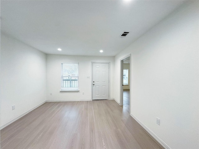 entryway with light hardwood / wood-style flooring