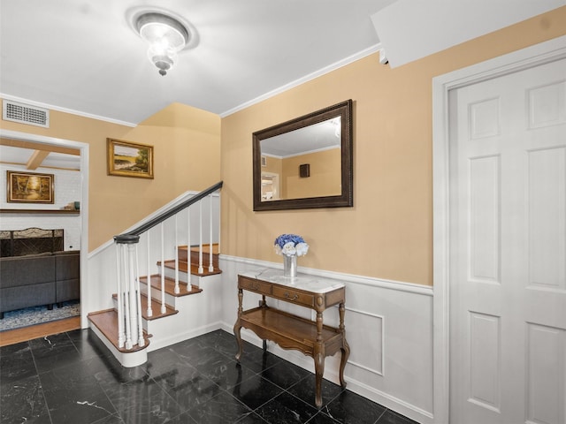 stairway with crown molding