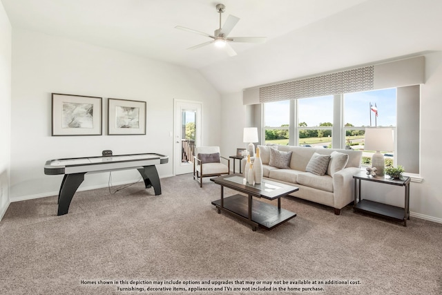 living room with lofted ceiling, carpet floors, and ceiling fan