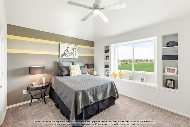 carpeted bedroom featuring lofted ceiling and ceiling fan