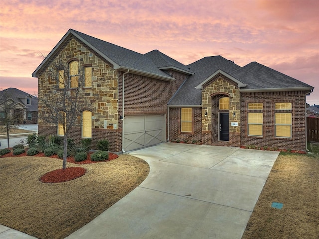 view of front of property with a garage