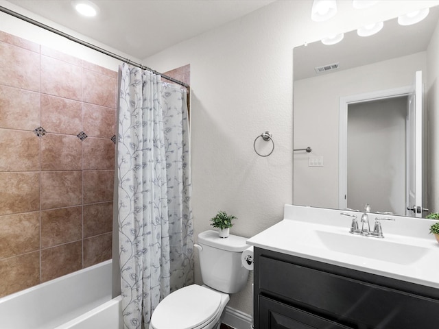 full bathroom featuring vanity, shower / bathtub combination with curtain, and toilet