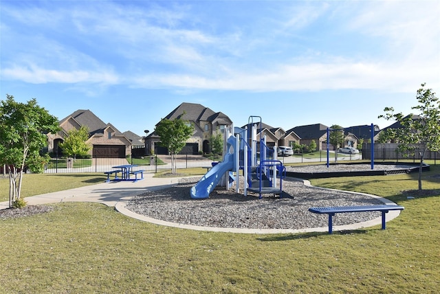 view of playground featuring a lawn