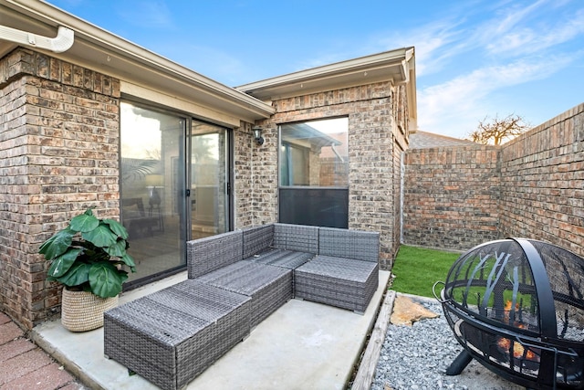 view of patio / terrace with outdoor lounge area and fence