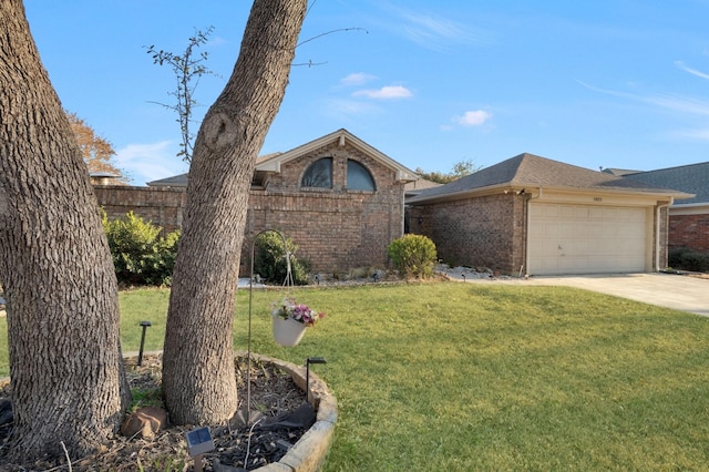 view of front of property with concrete driveway, a front yard, a shingled roof, a garage, and brick siding