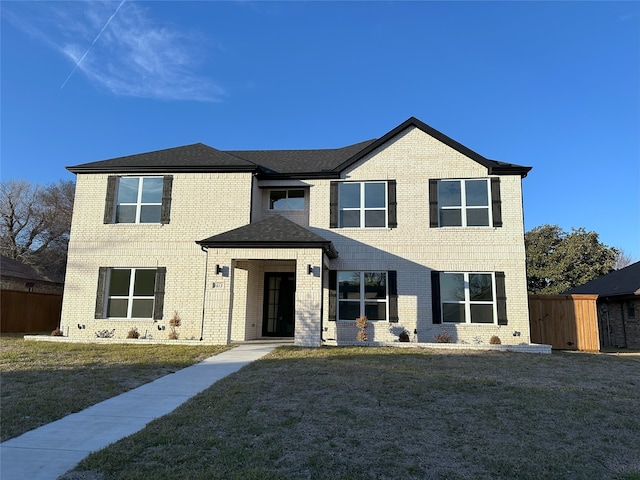 view of front of property with a front lawn