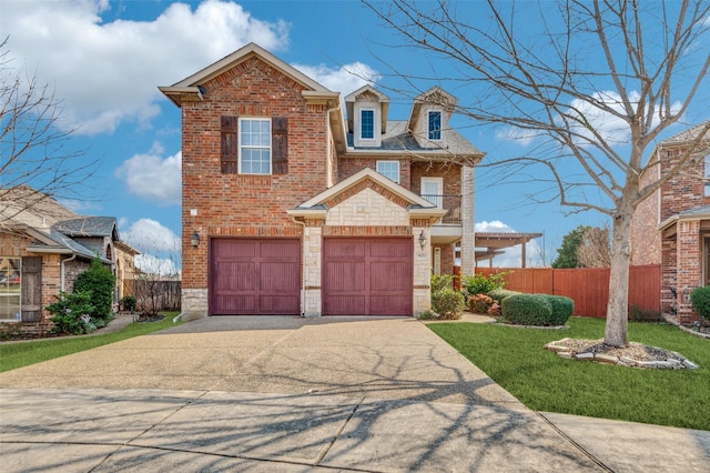 view of front of property featuring a garage and a front yard