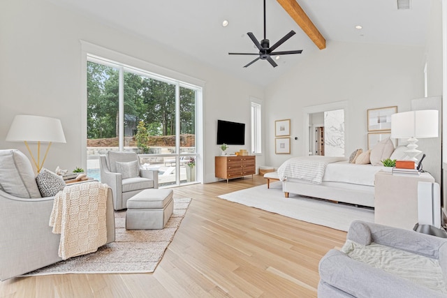 bedroom featuring ceiling fan, high vaulted ceiling, beamed ceiling, and light wood-type flooring