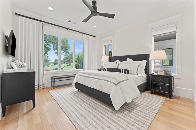 bedroom featuring ceiling fan and light wood-type flooring