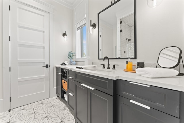 bathroom featuring crown molding, vanity, and walk in shower