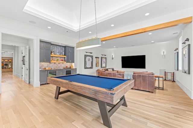 playroom with indoor bar, billiards, and light hardwood / wood-style flooring