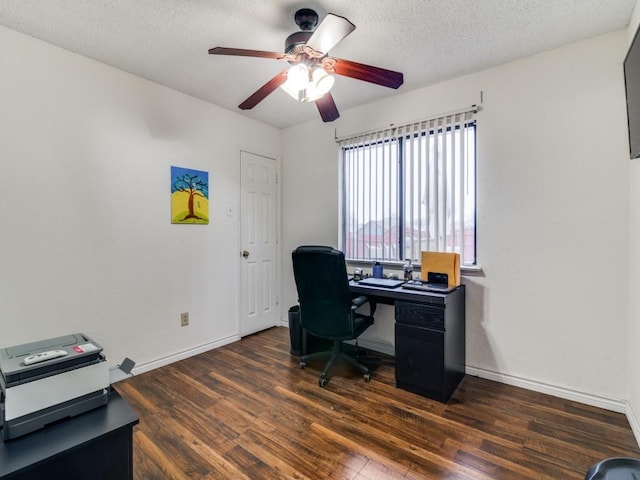 office area with ceiling fan, dark hardwood / wood-style flooring, and a textured ceiling