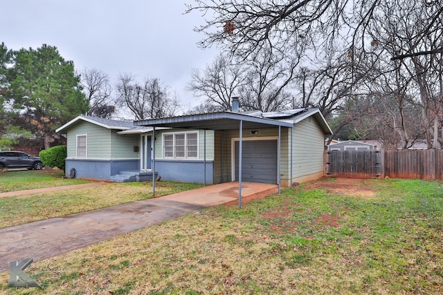 750 Peake St, Abilene, TX 79603 - view of front of house with concrete driveway, an attached garage, and brick siding