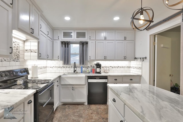 750 Peake St, Abilene, TX 79603 - kitchen featuring black appliances, a sink, tasteful backsplash, white cabinetry, and recessed lighting