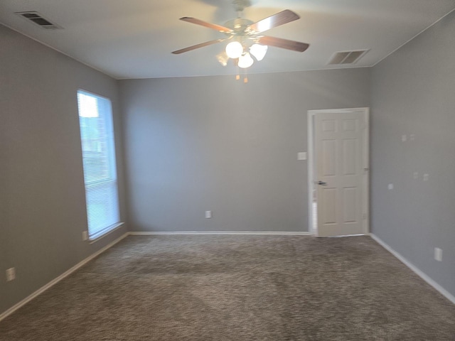 carpeted empty room with ceiling fan