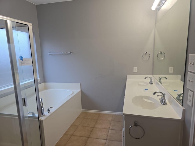 bathroom featuring tile patterned floors, independent shower and bath, and vanity