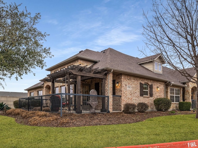 view of home's exterior featuring a yard and a pergola