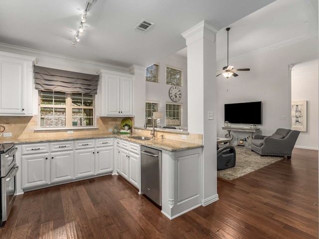 kitchen featuring stainless steel appliances, sink, white cabinets, and dark hardwood / wood-style floors