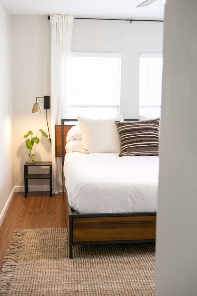 bedroom featuring wood-type flooring