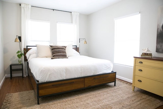 bedroom with wood-type flooring