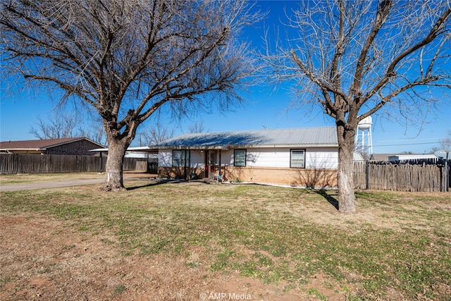 ranch-style house with a front yard