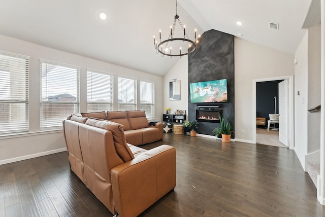 living room featuring high vaulted ceiling, dark wood-style flooring, a fireplace, and baseboards