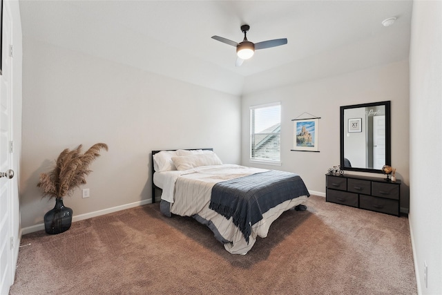 bedroom featuring carpet floors, baseboards, and a ceiling fan