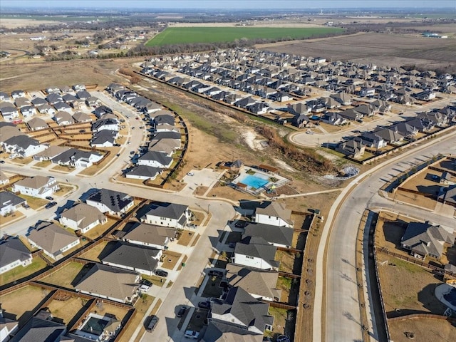 birds eye view of property with a residential view