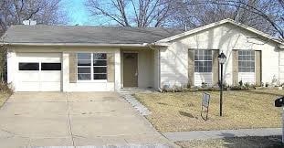 ranch-style house featuring a garage