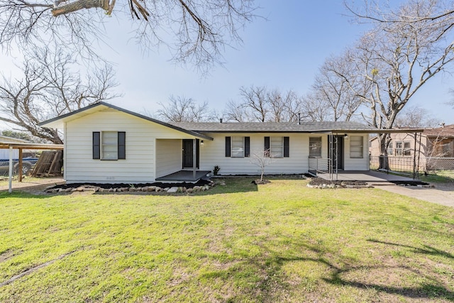 ranch-style home with a front yard