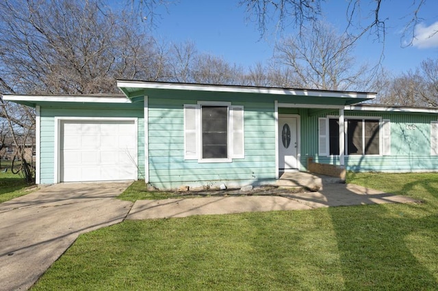 ranch-style house with a garage and a front yard