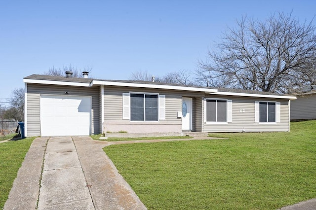 ranch-style home featuring a garage and a front yard