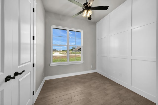 422 Collum Vw, Azle, TX 76020 - unfurnished bedroom featuring wood finished floors, baseboards, and ceiling fan