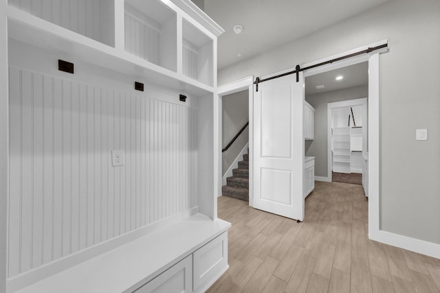 422 Collum Vw, Azle, TX 76020 - mudroom featuring a barn door, light wood finished floors, baseboards, and recessed lighting