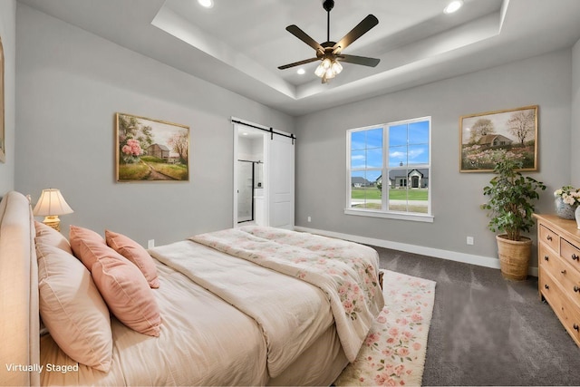 422 Collum Vw, Azle, TX 76020 - bedroom with a barn door, recessed lighting, a tray ceiling, carpet floors, and baseboards