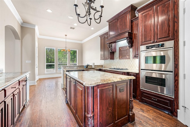 105 Zephyr Ct, Aurora, TX 76078 - kitchen with an inviting chandelier, dark wood-style flooring, stainless steel appliances, and decorative backsplash